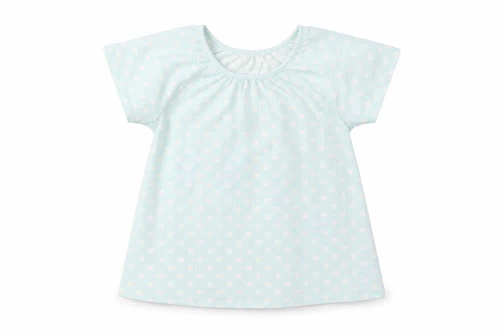 Front view of Uniqlo girls’ blue polka dot t-shirt, size 9-10, years