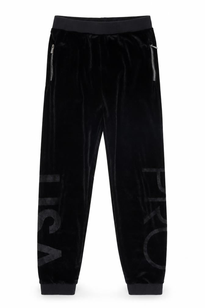 Front view of USA Pro girls’ black velvet jogger trousers, size 13, years