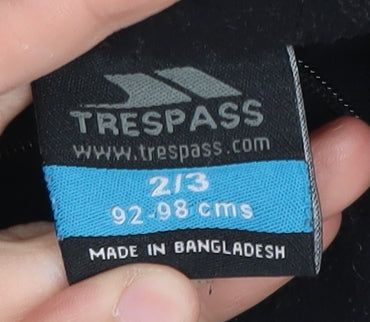 Brand and care label for Trespass boys’ black 1/2 zip sweatshirt 2-3 years lightweight