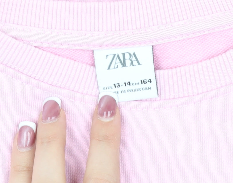 Close-up detail of Zara girls’ pink pullover sweatshirt 13-14 years crew neck