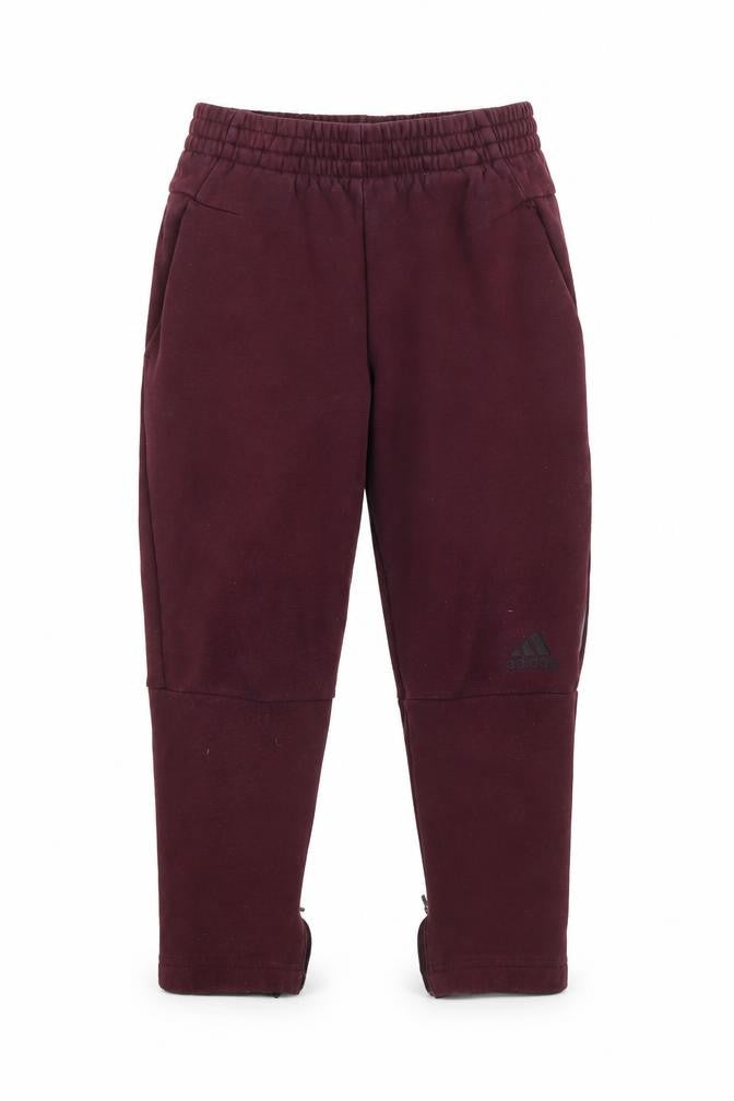 Front view of Adidas boys’ multicoloured jogger trousers, size 5, years