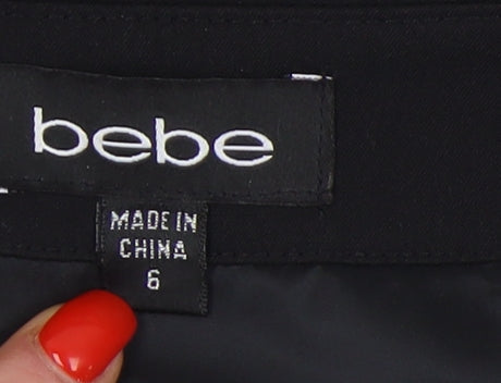 bebe Women's Black Short Skirt - Size 6, Elegant & Versatile