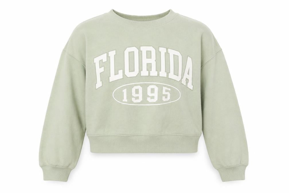 Front view of New Look girls’ green graphic sweatshirt 10-11 years pullover
