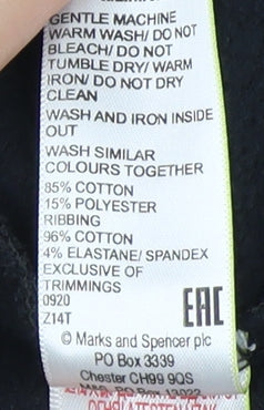 Close-up detail of Marks & Spencer boys’ black sweatshirt 11-12 years graphic sequin