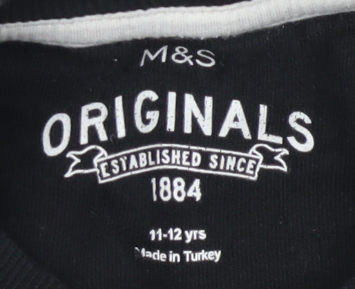 Brand and care label for Marks & Spencer boys’ black sweatshirt 11-12 years graphic sequin