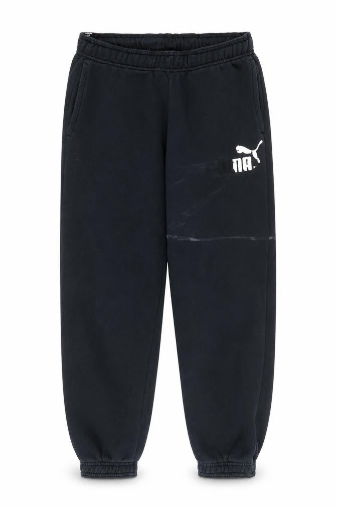 Front view of Puma boys’ black jogger trousers, regular fit, size 12