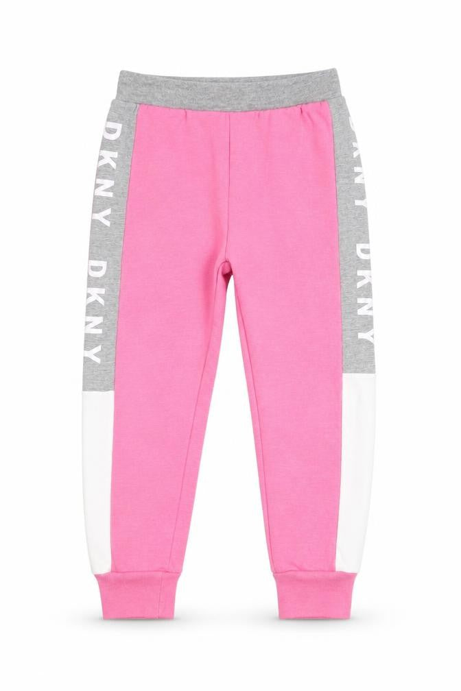 Front view of DKNY girls’ pink jogger trousers, size 5, elastic waist