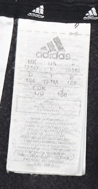 Close-up detail of Adidas boys’ black full zip hoodie 13-14 years with logo