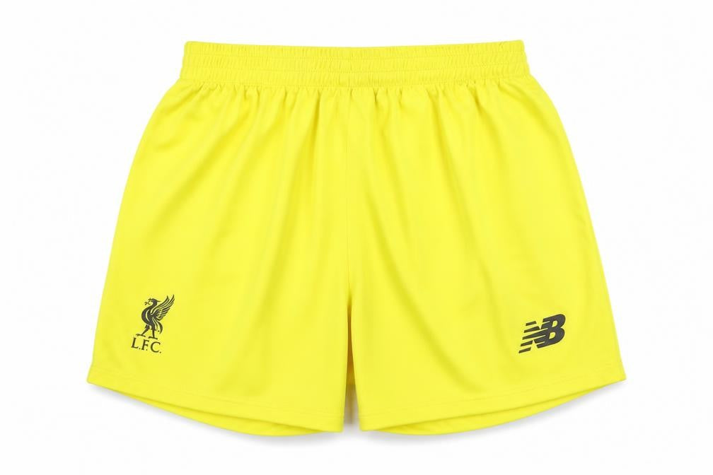 Front view of New Balance boys’ athletic yellow football shorts -, size 6-7y