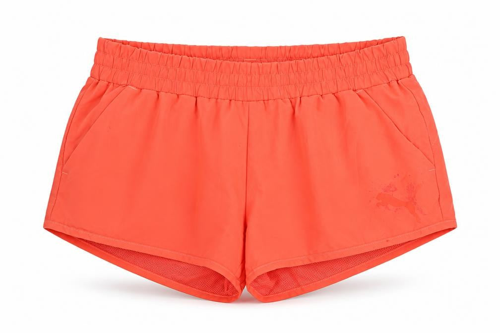 Front view of Puma Women's Orange Athletic Shorts, size 10