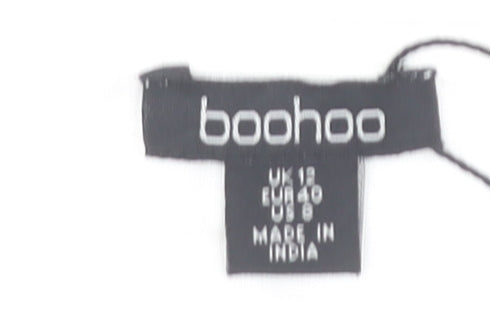 Brand and care label for Boohoo Women's White Off Shoulder Dress, size 12
