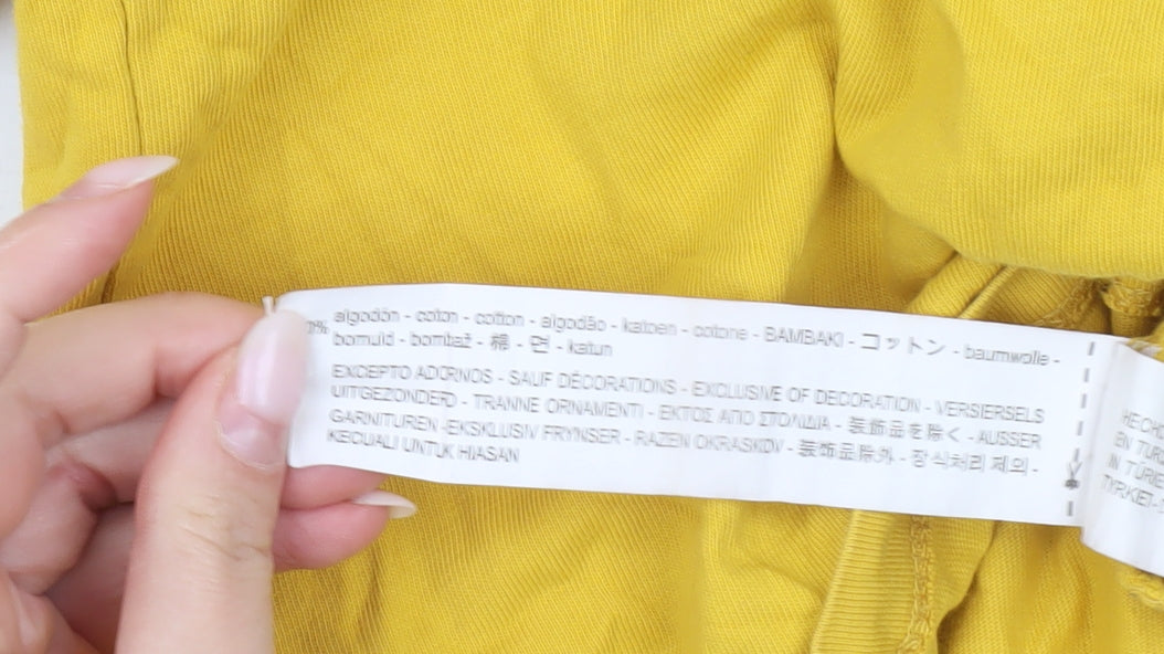 Zara Women Yellow Cotton Button Accent T-Shirt Size M