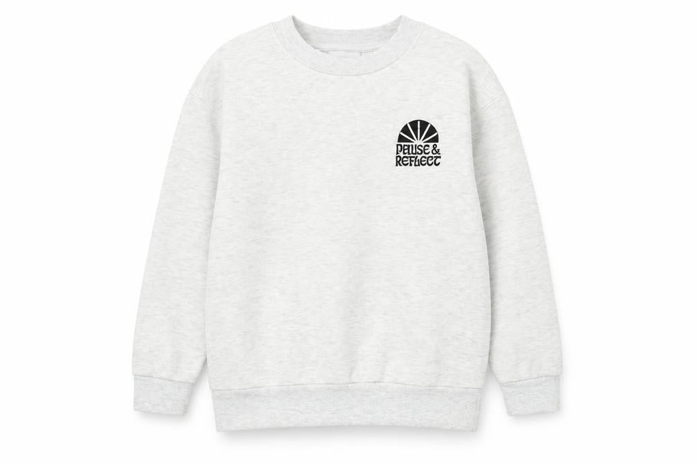 Front view of Primark girls’ grey sweatshirt 9-10 years crew neck logo print