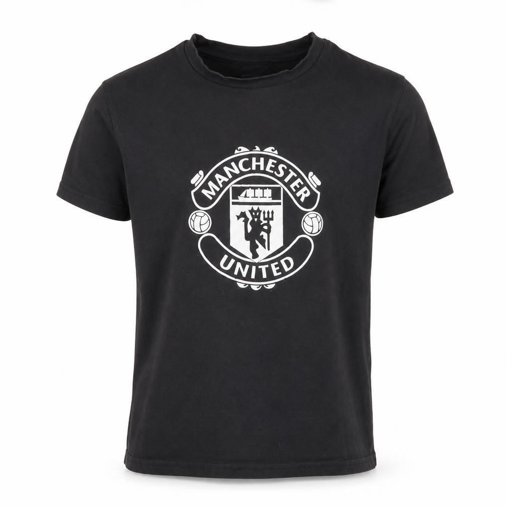 Front view of Manchester United boys’ black 6-7 years short sleeve cotton football t-shirt