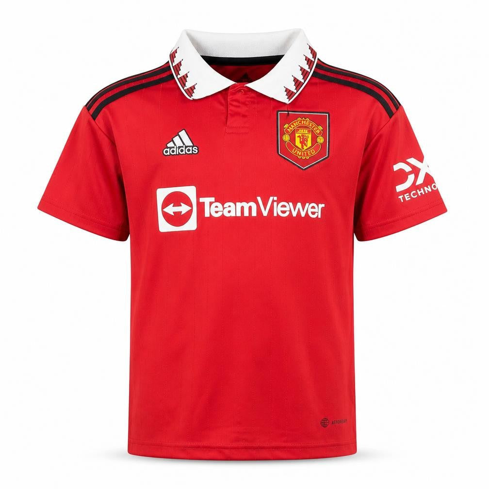 Front view of Adidas boys’ red manchester united football polo jersey 9-10 years