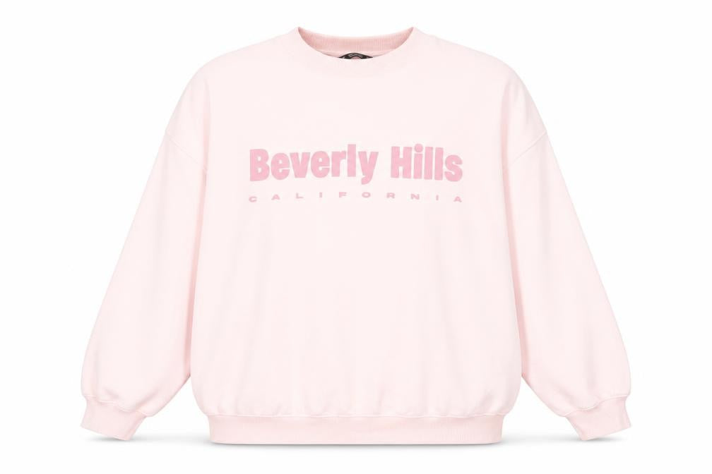 Front view of Dunnes women’s pink beverly hills sweatshirt l casual