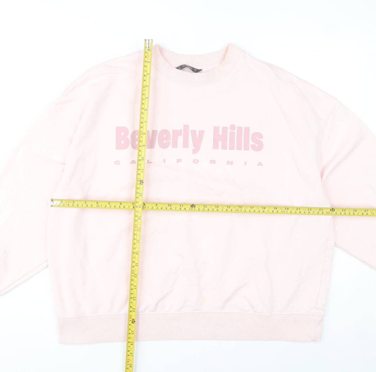Back view of Dunnes women’s pink beverly hills sweatshirt l casual
