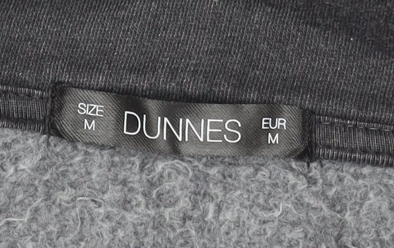 Brand and care label for Dunnes Women’s Charcoal 1/4 Zip Brooklyn NYC Sweatshirt, size M