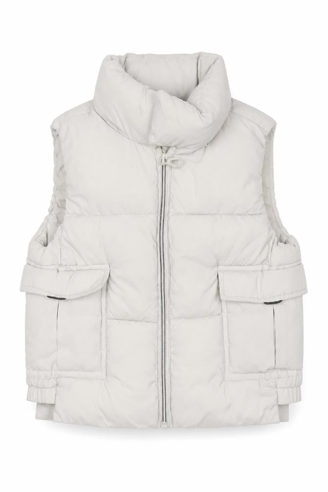 Front view of Zara girls’ beige puffer jacket 2-3 years sleeveless quilted gilet