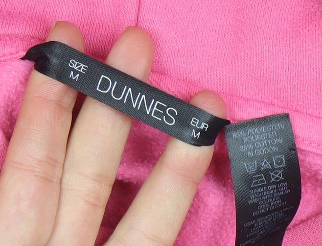 Brand and care label for Dunnes Women Pink Pullover Hoodie Medium Fleece Lined Casual