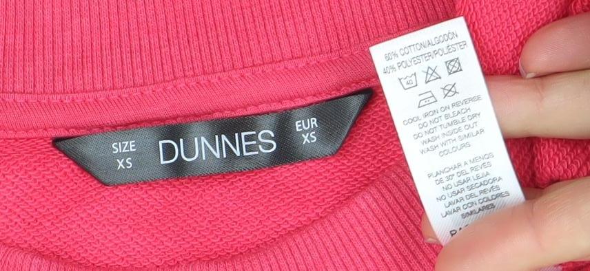 Brand and care label for Dunnes Women Pink XS Pullover Sweatshirt California LA Graphic Print