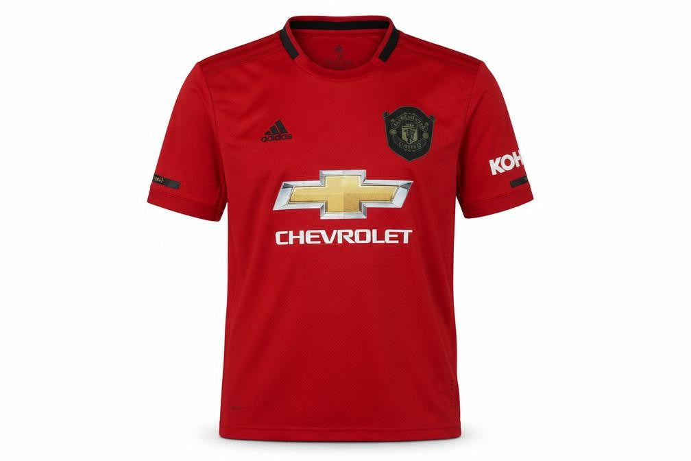 Front view of Adidas boys’ red manchester united football jersey short sleeve, size M