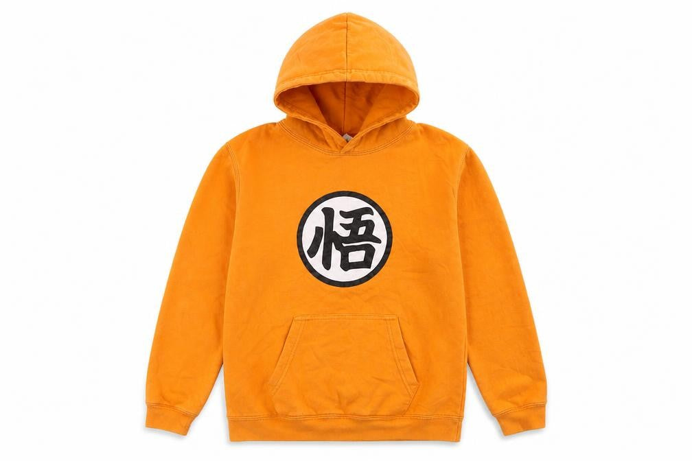 Front view of Just Hoods boys’ orange anime graphic pullover hoodie xl 12-13 years