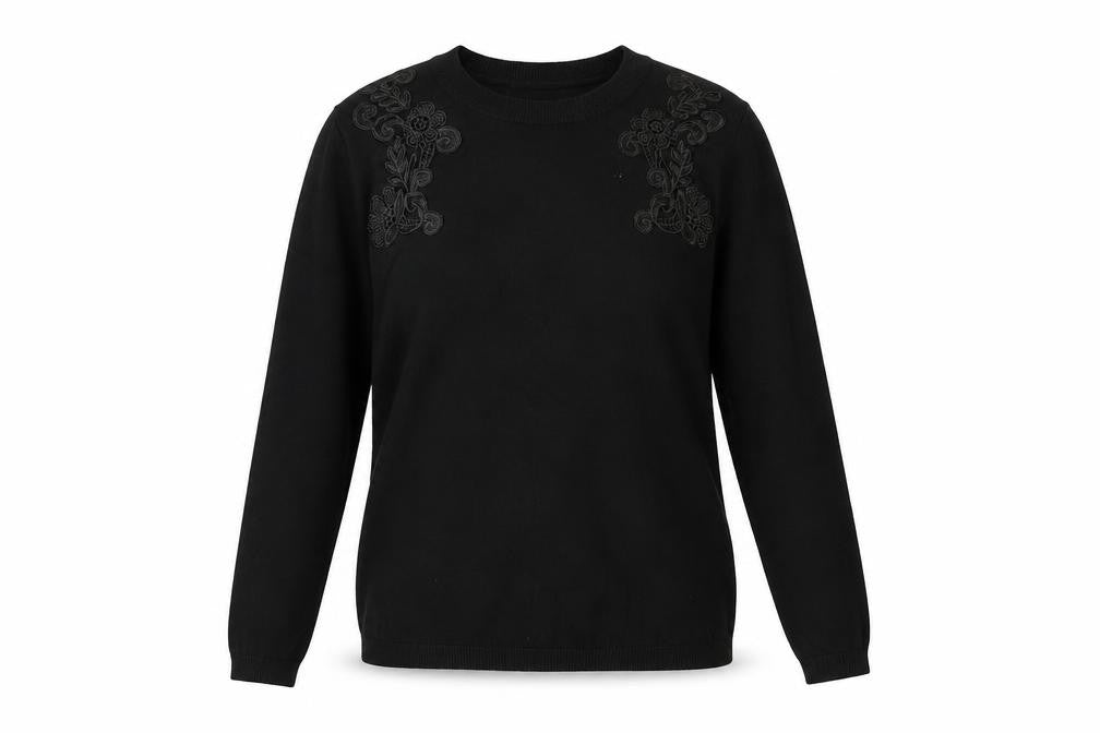 Front view of Dunnes women’s black embroidered crew neck long sleeve jumper, size UK 8