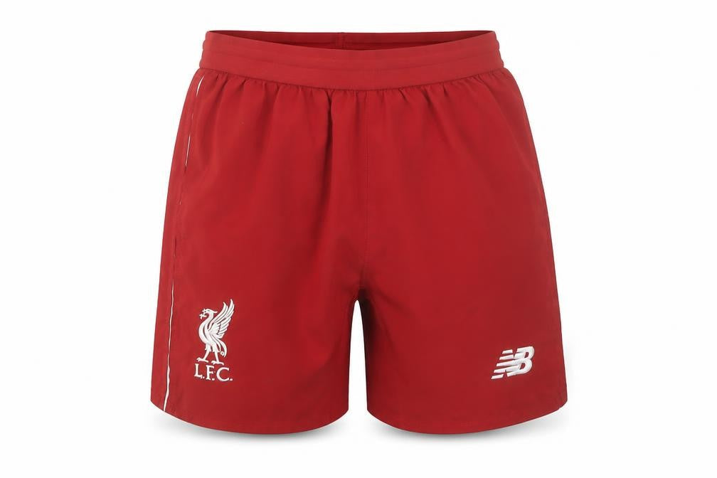 Front view of New Balance boys’ red lfc athletic football shorts, size 9, years