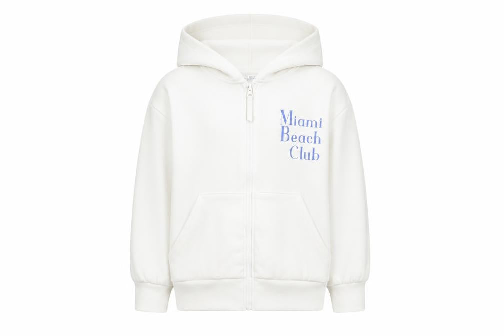 Front view of Primark girls’ white full zip hoodie 8 years miami beach club graphic