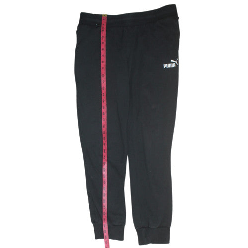 Back view of Puma women’s black jogger fleece sweatpants, size UK 14, regular
