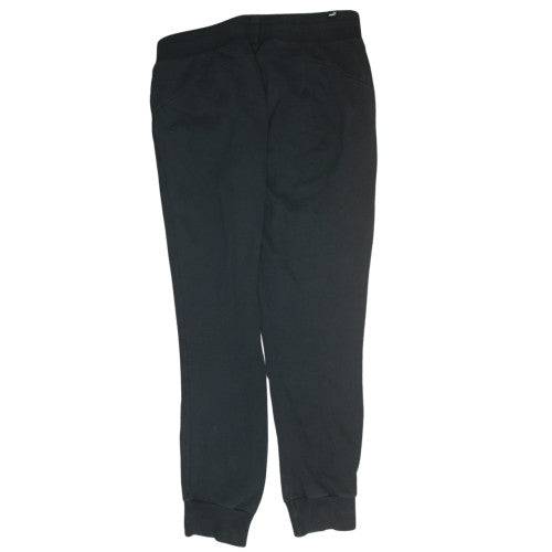Brand and care label for Puma women’s black jogger fleece sweatpants, size UK 14, regular