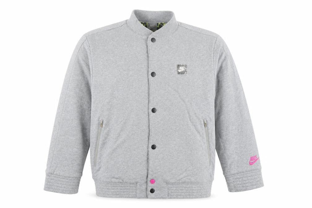 Front view of Nike girls’ grey bomber jacket lined cotton blend, size 12-13, years