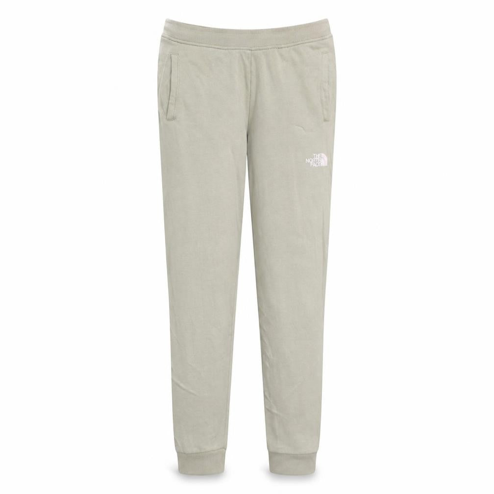 Front view of The North Face girls’ beige jogger sweatpants l fleece activewear trousers