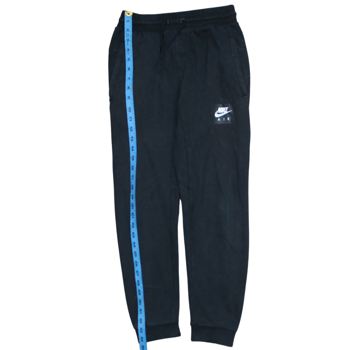 Close-up detail of Nike boys’ black jogger sweatpants 12-13 years cotton blend drawstring