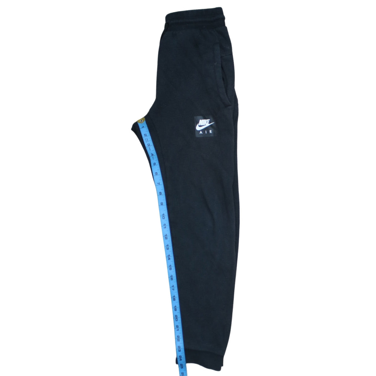 Brand and care label for Nike boys’ black jogger sweatpants 12-13 years cotton blend drawstring