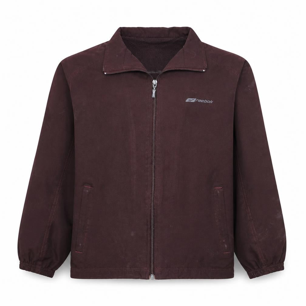 Front view of Reebok boys’ brown full zip track jacket, size 12, years polyester lined