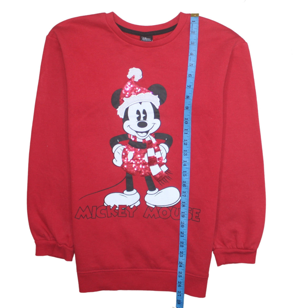 Close-up detail of Disney at Primark girls’ red mickey mouse sequin christmas sweatshirt 13-14 years