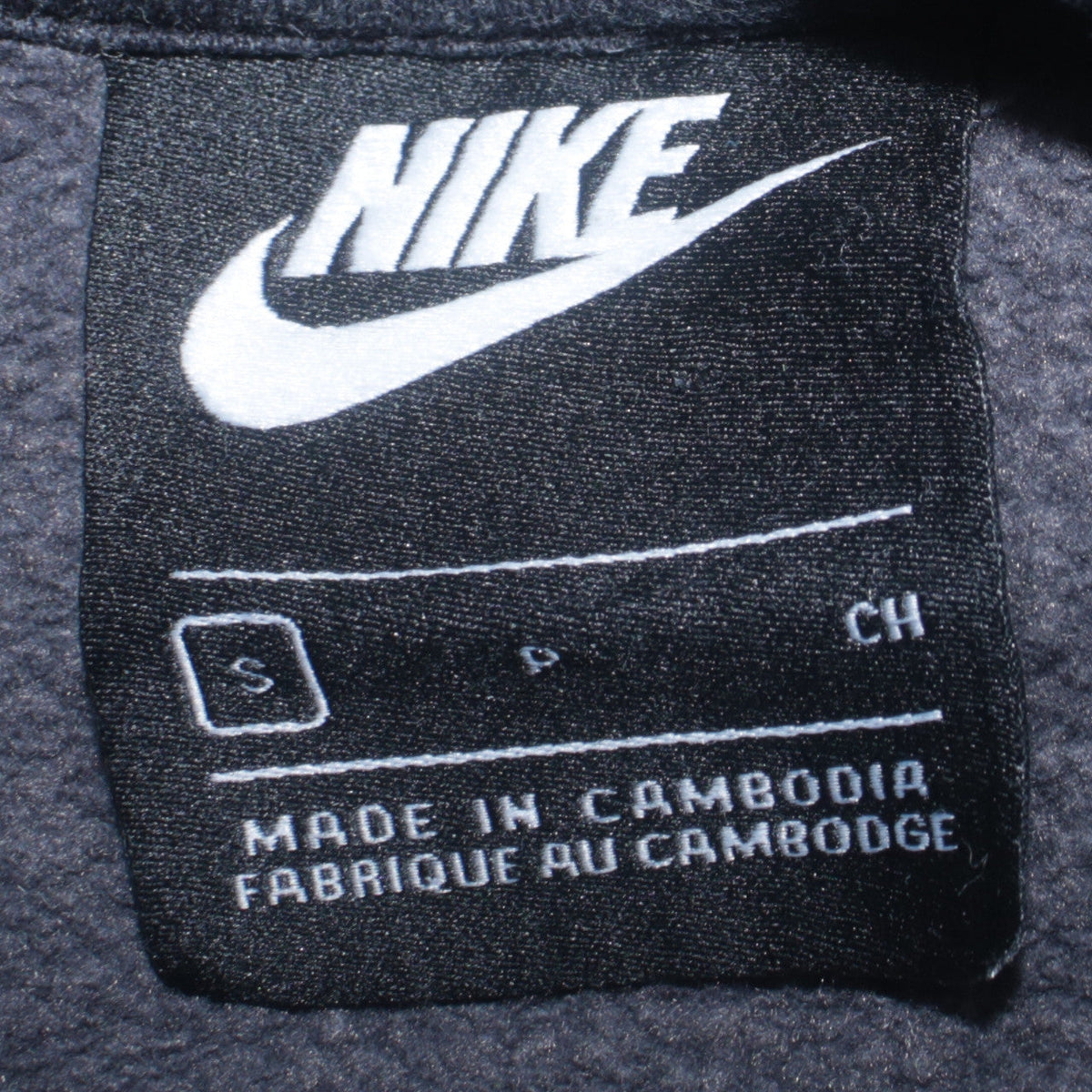 Close-up detail of Nike Men's Grey Pullover Hoodie Small Fleece Logo Sportswear