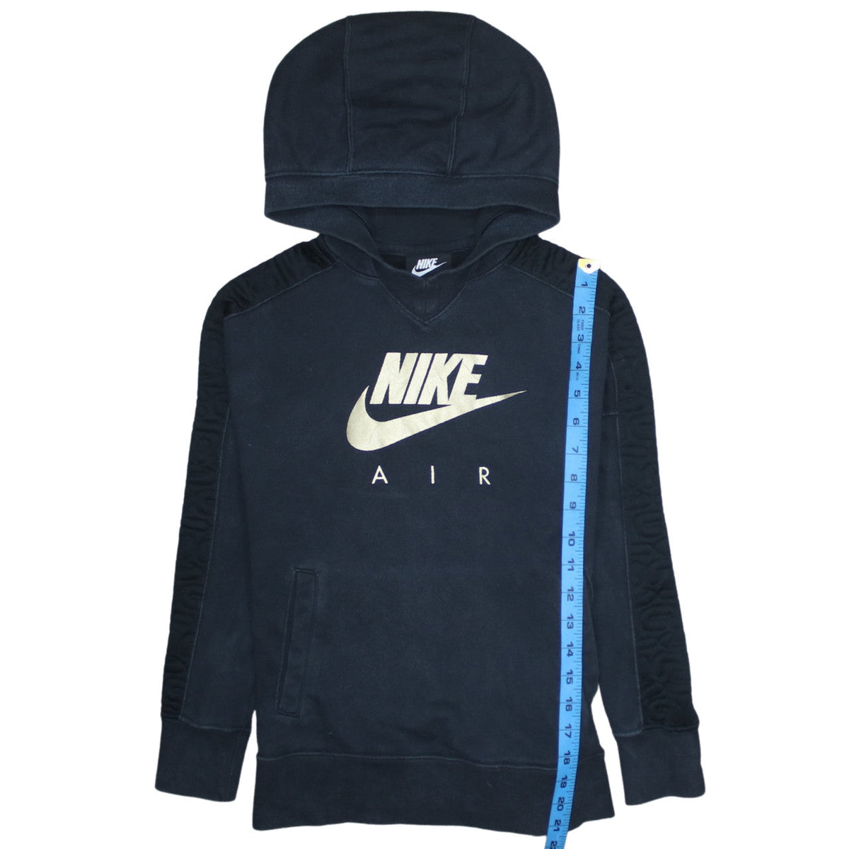 Close-up detail of Nike girls’ black air pullover hoodie fleece sweatshirt, size 146