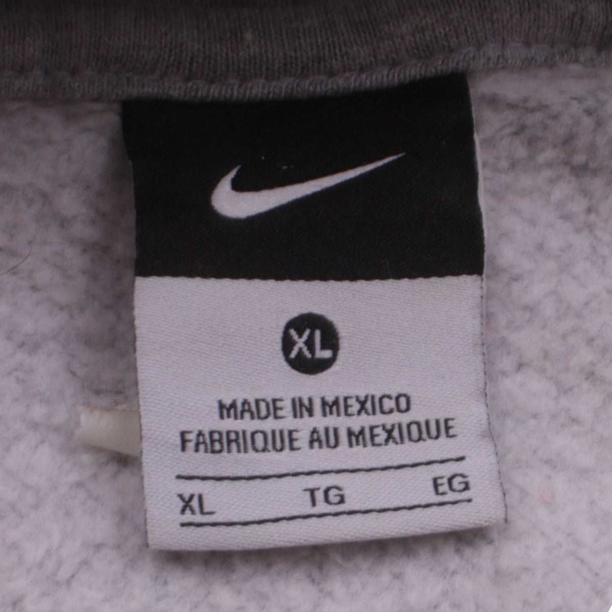 Close-up detail of Nike men’s grey xl pullover hoodie twins just do it sports fleece
