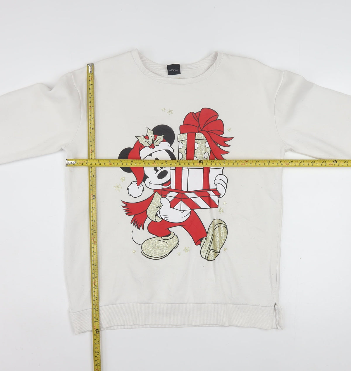 Back view of Disney at Primark girls’ beige mickey mouse christmas sweatshirt 14-15 years