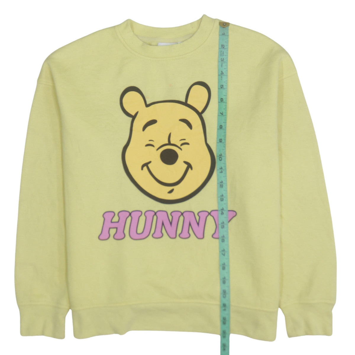 Close-up detail of Disney Women Yellow XS Winnie the Pooh Hunny Pullover Sweatshirt