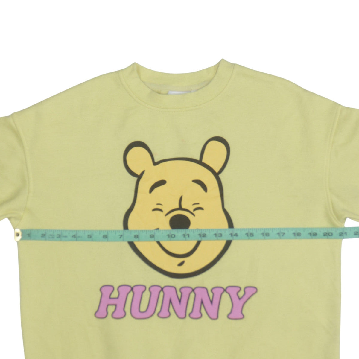 Brand and care label for Disney Women Yellow XS Winnie the Pooh Hunny Pullover Sweatshirt