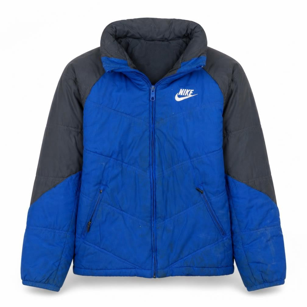 Front view of Nike boys’ blue puffer jacket 10-12 years full zip winter coat