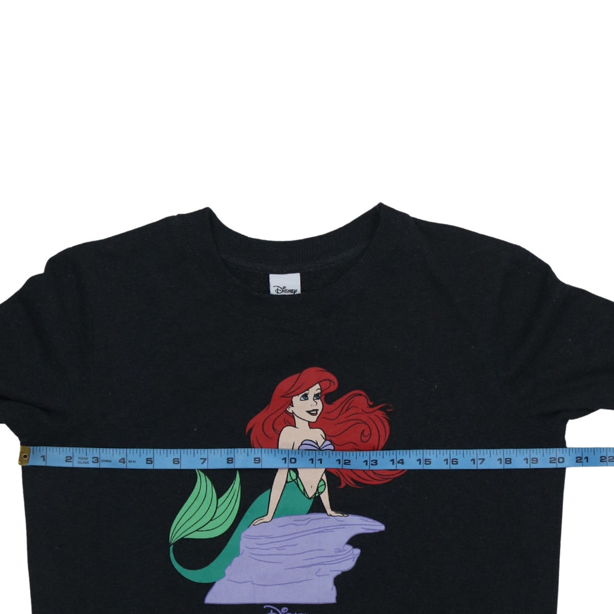 Close-up detail of Disney Women’s Black The Little Mermaid Pullover Sweatshirt, size S