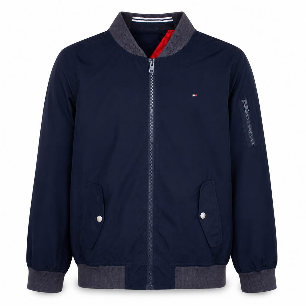 Front view of Tommy Hilfiger boys’ blue bomber jacket, size 164, full zip lined casual