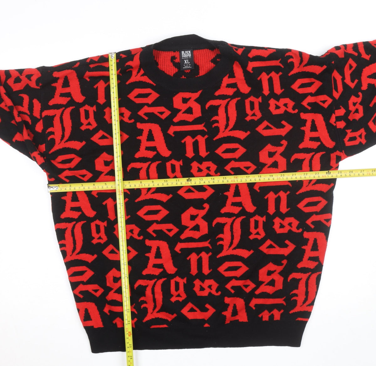 Close-up detail of Black Squad Men's Red Black Graphic Knit jumper XL