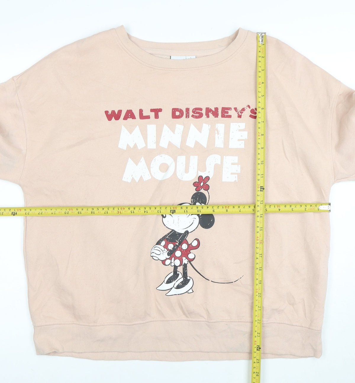 Close-up detail of Disney Women Beige Minnie Mouse Pullover Sweatshirt, size 16 L