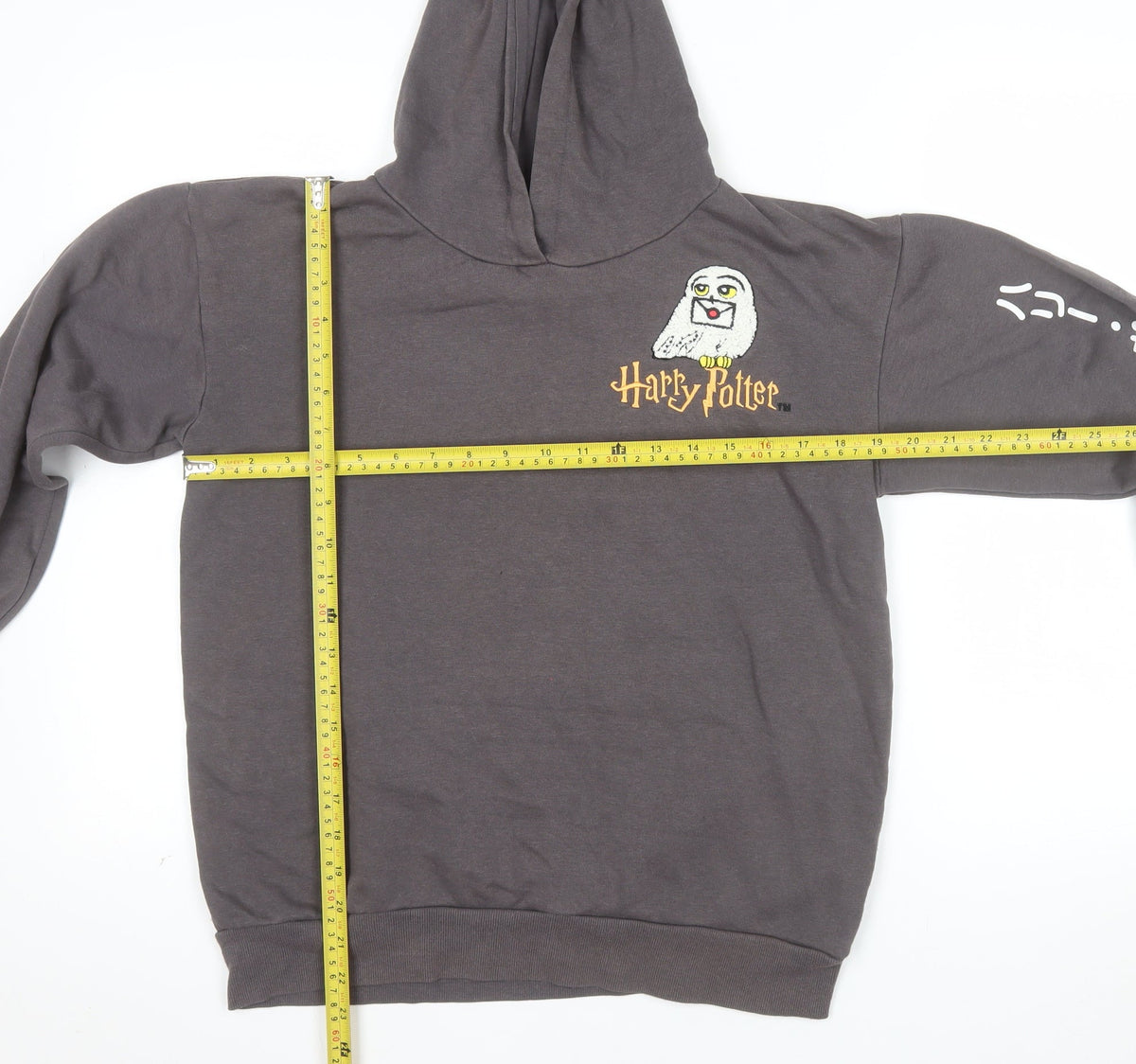Back view of Harry Potter girls’ grey pullover hoodie 12-13 years embroidered graphic